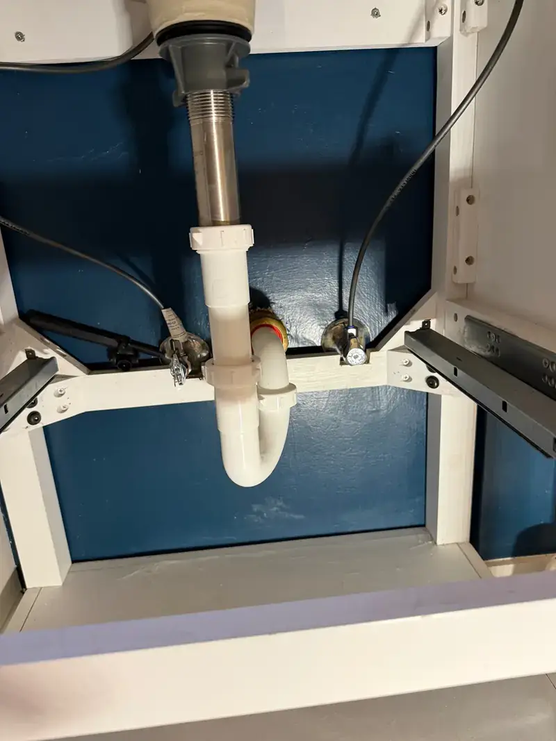 Under-sink P-trap drain repair by Bigfoot Plumbing in Boring, Oregon